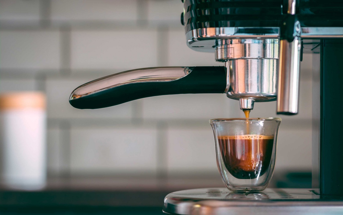 machine pouring espresso 4th wave of coffee